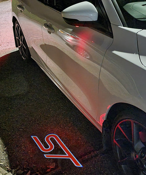 “ST” Emblem Replacement Puddle Unit - MK4 / MK4.5 Focus ST (Multiple Colours)