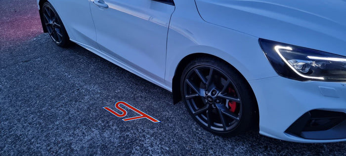 “ST” Emblem Replacement Puddle Unit - MK4 / MK4.5 Focus ST (Multiple Colours)