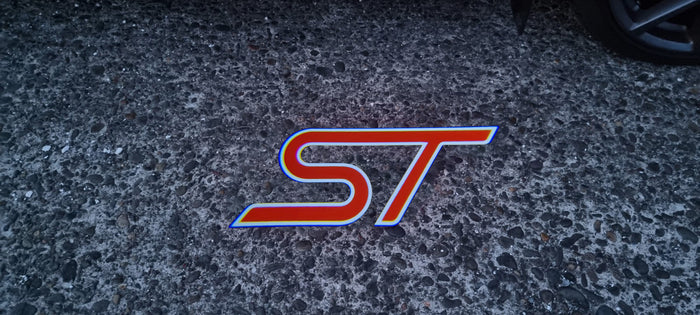 “ST” Emblem Replacement Puddle Unit - MK4 / MK4.5 Focus ST (Multiple Colours)
